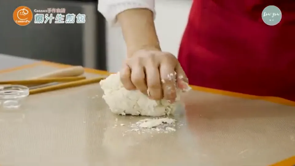 Kneading leavened dough smooth on work mat